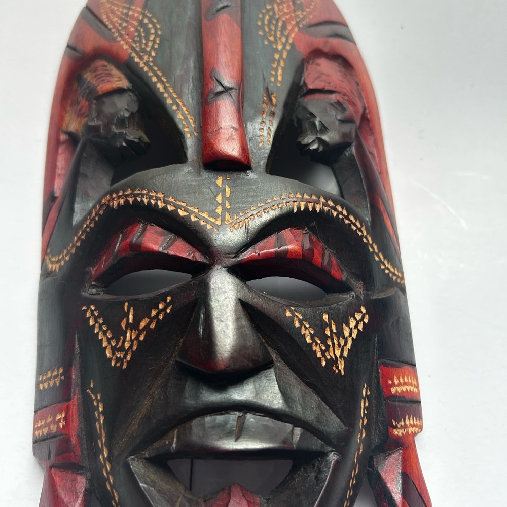 Handcrafted Wood Tribal Mask with Red and Black Accents